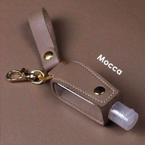 Keychain with hand sanitizer empty plastic bottle